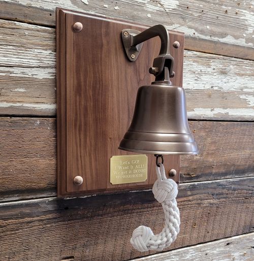 Antiqued Brass Bell on Wood Plaque